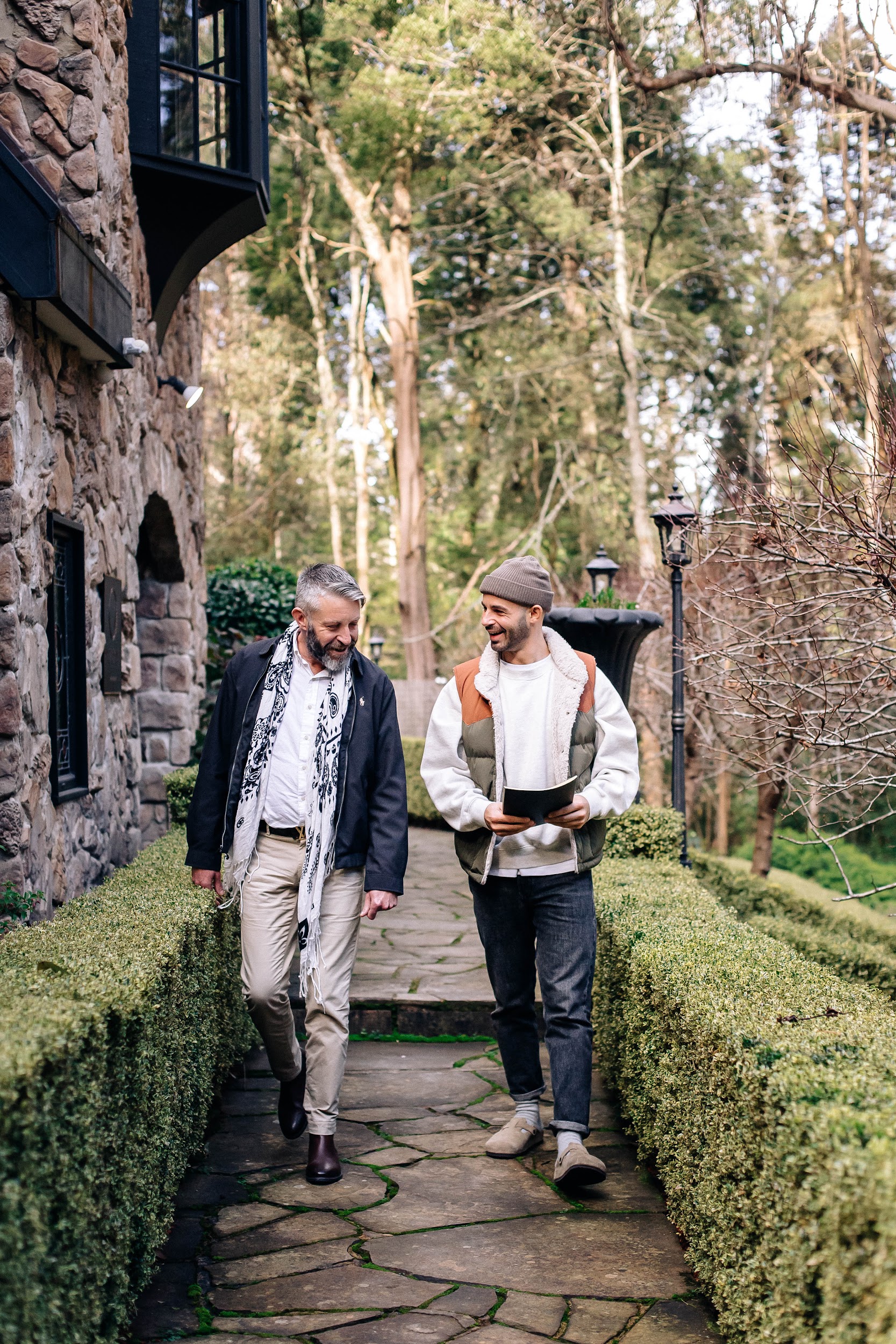 two man walking in the fancy garden